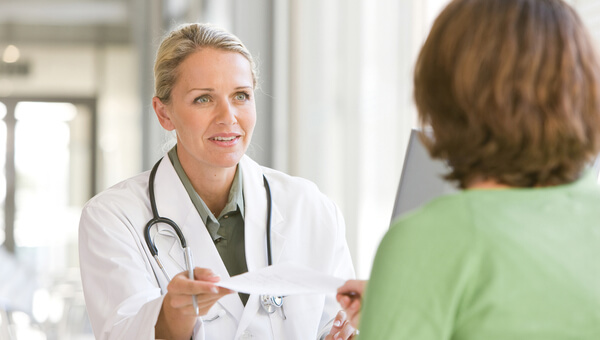 a doctor sharing information with her patient