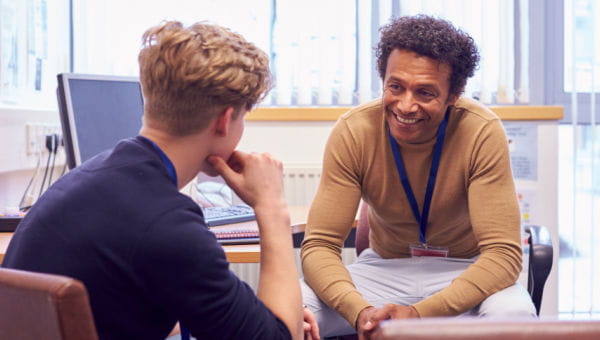 Male meeting with a male counselor discussing mental health issues