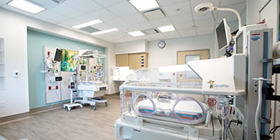 view of a twins NICU room with 2 beds in the South Florida Baptist Hopsital