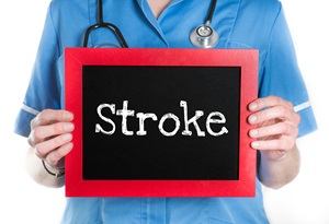 A doctor holding a sign that says "Stroke."