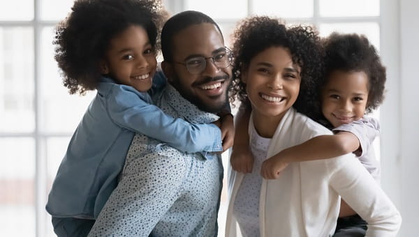 A husband and wife and their two young children