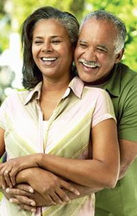 man hugging a woman